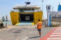 Unloading vehicles from ferry boat in Piombino seaport, Italy