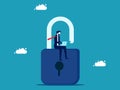 Unlock and access data. Encrypted businessman unlocks the key with a laptop.