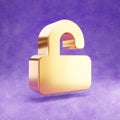 Unlock icon. Gold glossy Unlock symbol isolated on violet velvet background.