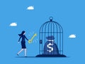 Unlock money. Businesswoman uses a key to unlock a money bag from a birdcage. business competition concept