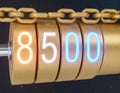Unlock security with a golden combination lock featuring an 8500 code and chain Royalty Free Stock Photo