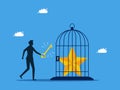 Unlock success in work. man uses a key to release the stars in the cage. business concept