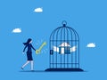 Unlock the value of the asset. Businesswoman uses a key to unlock a house from a birdcage. business and investment concept