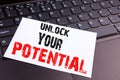 Unlock Your Potential writing text made in the office close-up on laptop computer keyboard. Business concept for Growth and Develo Royalty Free Stock Photo