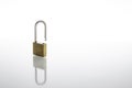 Unlocked and opened padlock as security or privacy concept, isolated on white background with reflex Royalty Free Stock Photo