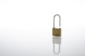 Unlocked and opened padlock as security or privacy concept, isolated on white background with reflex Royalty Free Stock Photo