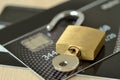 Unlocked padlock with key on credit card - Concept of security and protected paying
