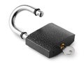 Unlocked steel padlock with inserted key