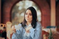 Unlucky Woman Staining her Blouse with Coffee in a Restaurant Royalty Free Stock Photo