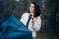 Unlucky Woman Standing Outside with Broken Umbrella Royalty Free Stock Photo