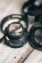 Unmade pieces of a photography camera lens with convex glasses lens and electronic devices