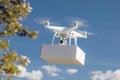 Unmanned Aircraft System UAS Quadcopter Drone Carrying Blank Box Royalty Free Stock Photo