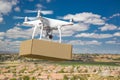 Unmanned Aircraft System UAS Quadcopter Drone Carrying Blank Package Over Neighborhood Royalty Free Stock Photo