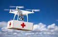 Unmanned Aircraft System UAS Quadcopter Drone Carrying First Aide Kit Royalty Free Stock Photo