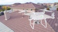 Unmanned Aircraft System UAV Quadcopter Drone Over Homes