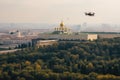 Unmanned military drone flies in the sky over Moscow , 3d rendering. Concept: combat strike drone, aerial attack on Kremlin, Royalty Free Stock Photo