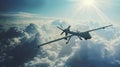 Unmanned military drone flying in the sky above the clouds, American technology. Concept: military reconnaissance drone Royalty Free Stock Photo