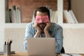 Unmotivated tired male employee sleep in office