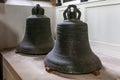 Unmounted bells on display in St Oswald\'s church, Durham