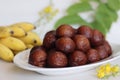 Unniyappam. Delicious sweet rice fritters made with a batter of rice, banana, jaggery, ghee fried coconut pieces, black sesame