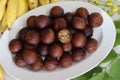 Unniyappam. Delicious sweet rice fritters made with a batter of rice, banana, jaggery, ghee fried coconut pieces, black sesame