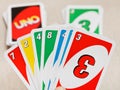 Uno card game pack in hand Royalty Free Stock Photo