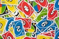 Uno game cards scattered all over the frame background Royalty Free Stock Photo