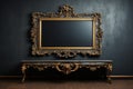 An unoccupied gold frame hangs on a dark wall