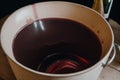 An unopened bottle of rose wine in a bucket