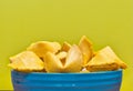 Unopened fortune cookies in a blue ceramic bowl. Royalty Free Stock Photo