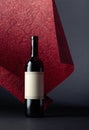 Unopened red wine bottle with empty label Royalty Free Stock Photo