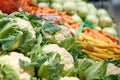 Unpacked, fresh vegetables in a self-service supermarket