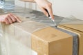 Unpacking the bed with grey mattress. Moving to new House Concept. selective focus. Royalty Free Stock Photo