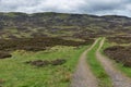 Unpaved country road in Scottish Highlands near Loch Tay Royalty Free Stock Photo