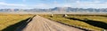 Unpaved road and yurts near Son-Kul lake in Kyrgyzstan