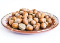 Unpeeled hazelnuts plate