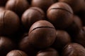 Unpeeled Macadamia nuts texture background Royalty Free Stock Photo