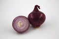 Unpeeled Whole red Onion and a Half