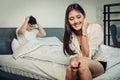 Unplanned Pregnancy concept, Wife is happy to know she pregnant while the husband boyfriend is stress and feel not ready to be Royalty Free Stock Photo