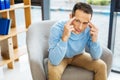 Depressed adult man having a headache Royalty Free Stock Photo