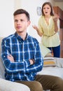 Unpleased person criticizing spouse