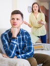 Unpleased person criticizing spouse