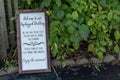 Unplugged Wooden Rustic Wedding Sign in Frame Royalty Free Stock Photo