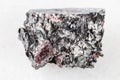 Unpolished red Garnet crystals in Biotite on white