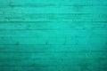 Unpolished teal wood texture background. Shabby planks painted in light green colour. Gunge natural texture Royalty Free Stock Photo