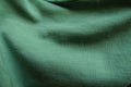 unprinted juniper green cotton in soft folds Royalty Free Stock Photo