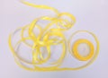 Unraveled yellow ribbon Royalty Free Stock Photo