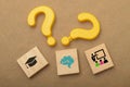 Unraveling Curiosity: Question Marks, Brain, and Education Hat as Symbols of Knowledge and Teaching Royalty Free Stock Photo
