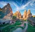 Unreal world of Cappadocia. Deep blue sky in the Uchisar Castle neighborhood. Colorful morning scene of Uchisar village, district