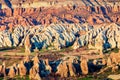 Unreal world of Cappadocia, Fairy Chimneys in Red Love Valley, Thousand of cave dwellings were carved out of the soft volcanic